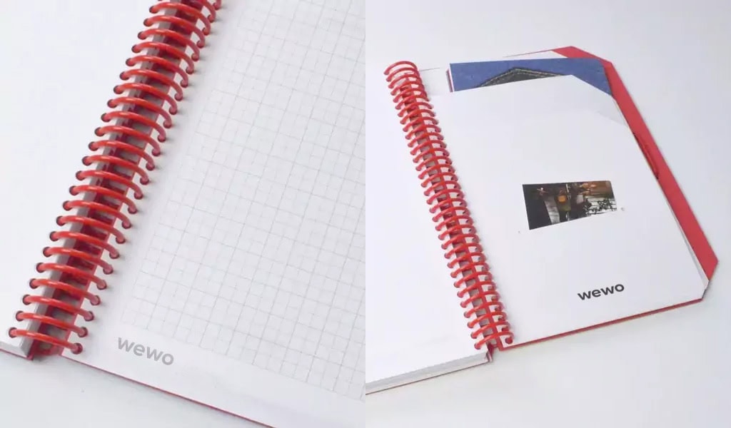 Cahiers personnalisés avec couverture colorée et spirale rouge, idéal pour un noteebook d'entreprise.